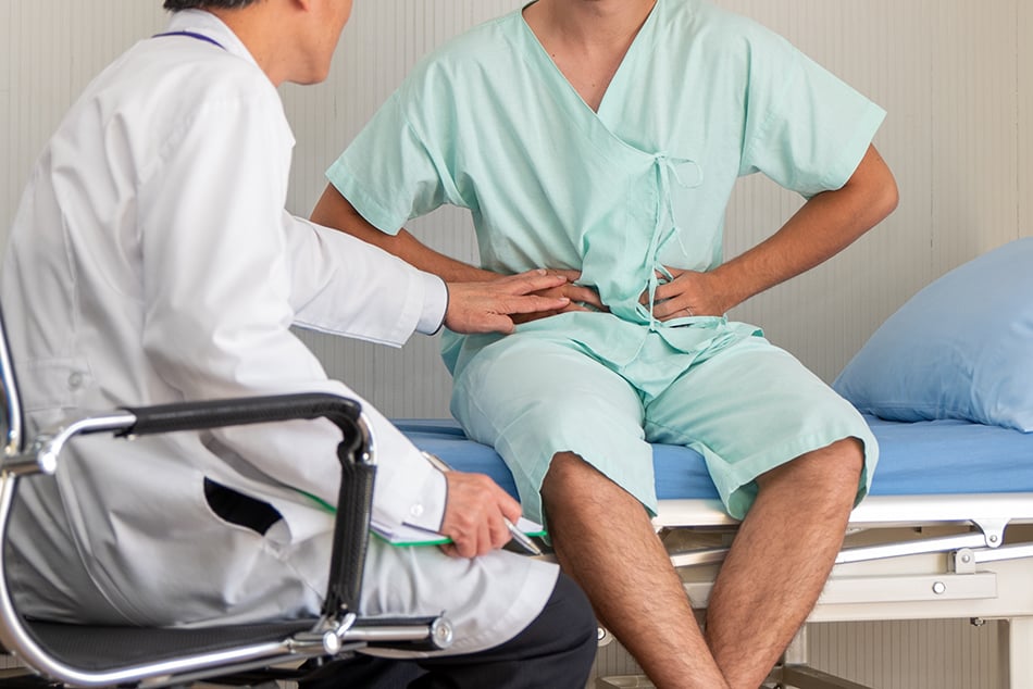 Doctor examining an urgent care patient.